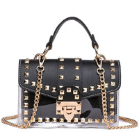 Luxurious black handbag with studs and transparent panels, perfect for stylish weddings and elegant occasions.