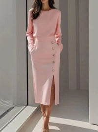 Long Sleeve Button Detail Midi Dress with Side Slit in pink, featuring button details and pockets.
