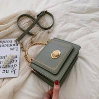 Elegant green leather mini crossbody bag with gold accents, perfect for luxurious weddings and everyday use.