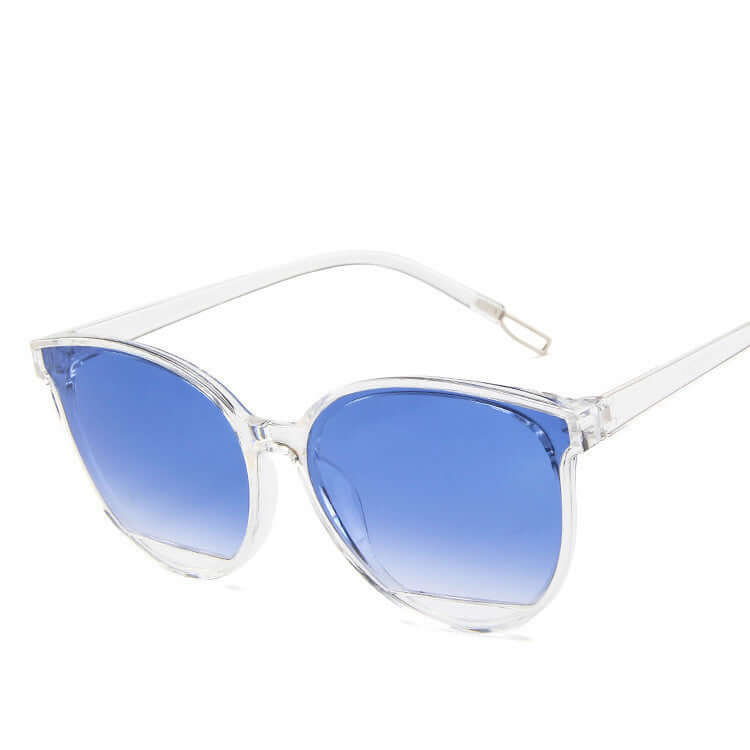 Ladies round frame sunglasses with blue gradient lenses, ideal formal wear accessory in NZ.