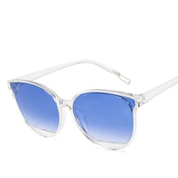 Ladies round frame sunglasses with blue gradient lenses, ideal formal wear accessory in NZ.