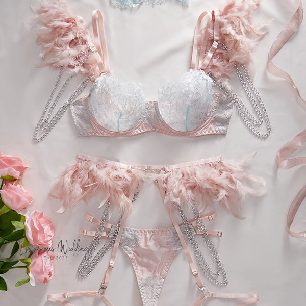 a pink and white lingerie with feathers on it