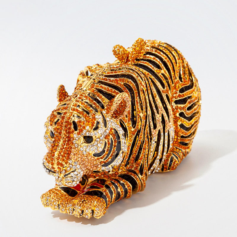 Sparkling tiger figurine adorned with crystals, perfect for luxury decor and bold statements in fashion.