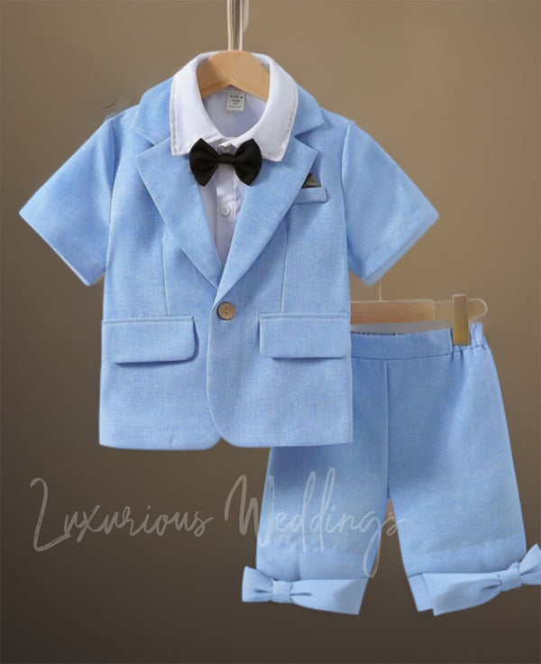 a baby boy's blue suit and bow tie