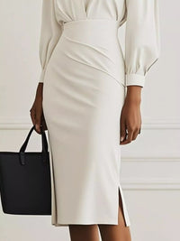 Ruched Midi Shirt Dress with Side Slit featuring a stylish side slit and elegant design, model holding a black handbag.