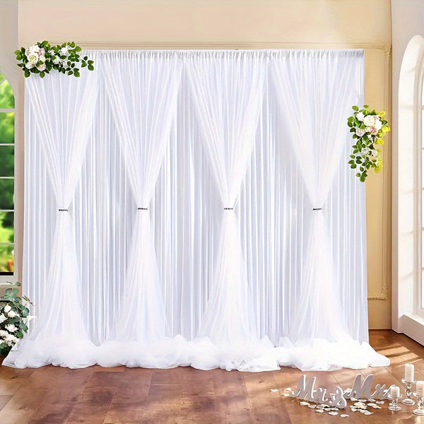 a room with a white curtain and flowers