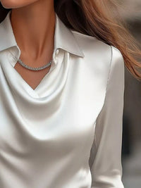 Ruched Long Sleeve Drape Collar Blouse featuring a draped collar and elegant satin finish.