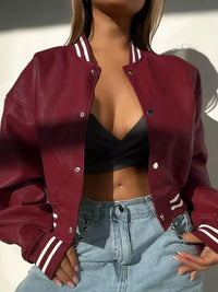 Snap Down Long Sleeve Jacket in burgundy with sporty stripes, styled with a black top and high-waisted jeans.