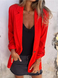 Full size lapel collar long sleeve blazer in vibrant red, styled with a black top and denim skirt.