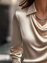 Ruched Long Sleeve Drape Collar Blouse featuring a silky drape collar and stylish necklace.