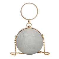 Luxurious spherical handbag in silver with gold chain, perfect for elegant weddings and special occasions.