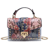Elegant women handbag with multi-colored snake print and gold studs, perfect for luxurious weddings and stylish occasions.