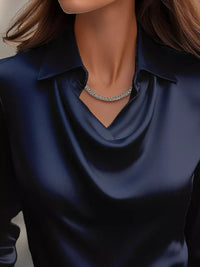 Ruched Long Sleeve Drape Collar Blouse detailed view featuring a stylish collar and elegant necklace.