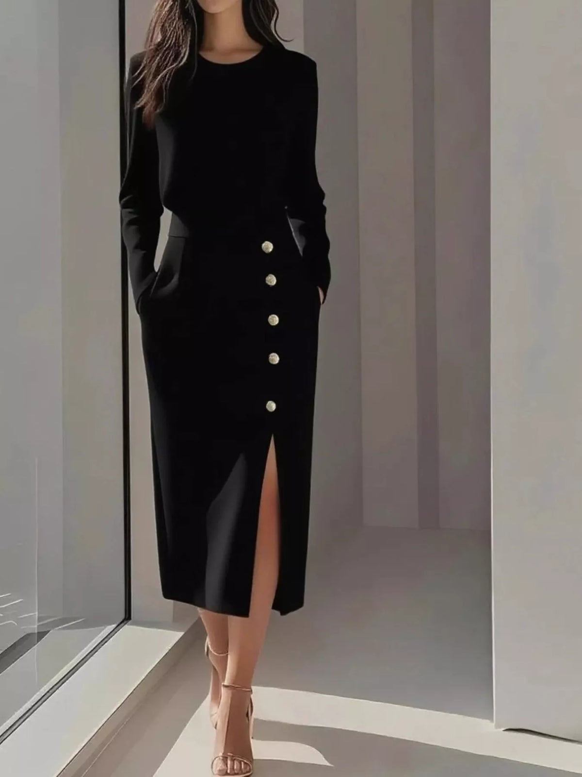 Long Sleeve Button Detail Midi Dress with Side Slit featuring a sleek black design and stylish button detailing.