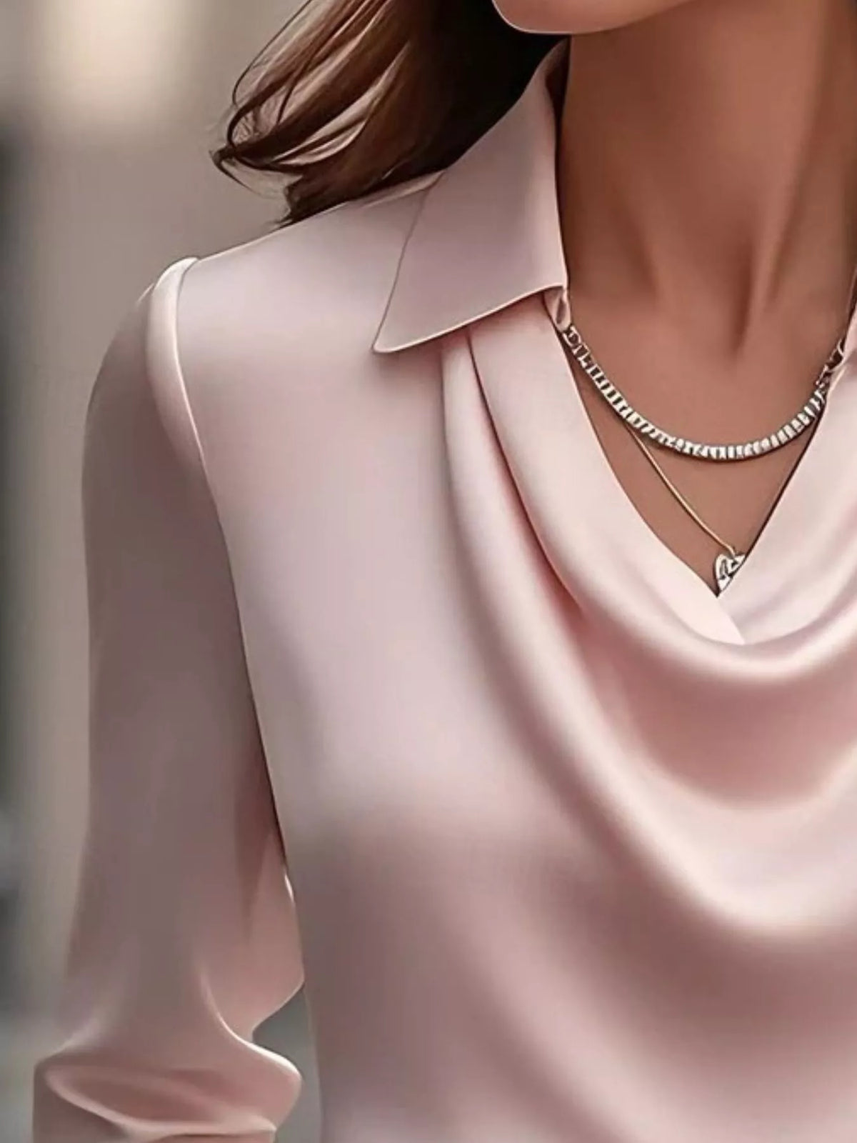 Ruched Long Sleeve Drape Collar Blouse in soft pink with drape collar detailing and necklace, perfect for elegant styling.