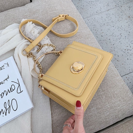 Stylish yellow leather mini crossbody bag for women, perfect for luxurious weddings and everyday elegance.