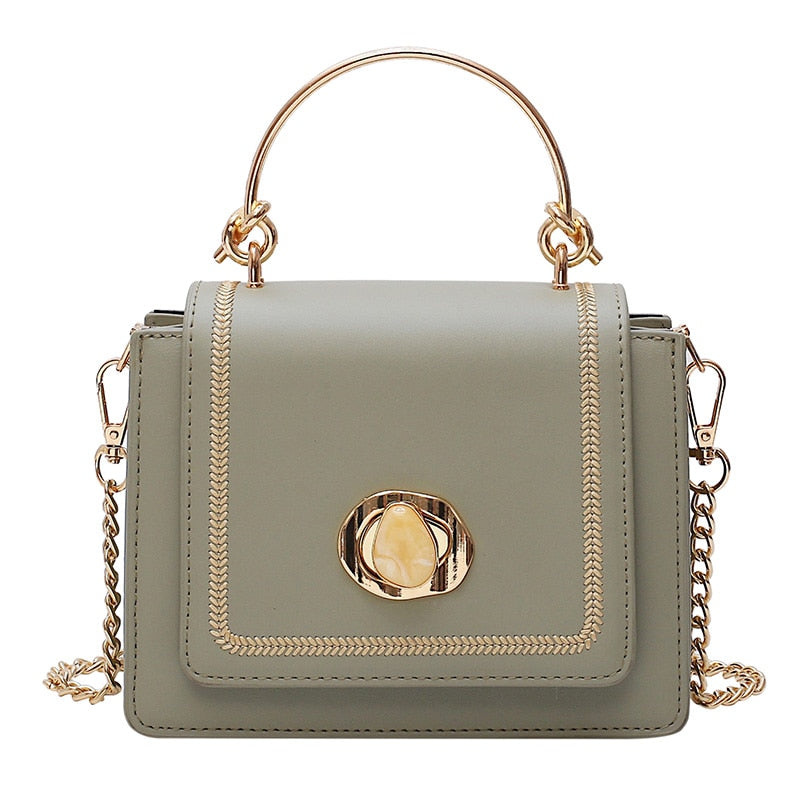 Elegant leather mini crossbody bag for women, perfect for luxurious weddings and modern occasions.