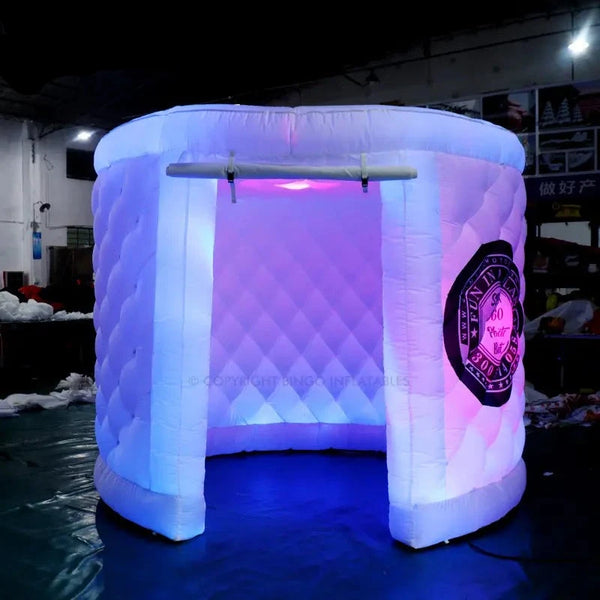 an inflatable tent with a pink light inside