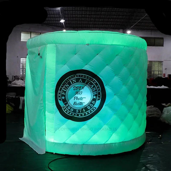 a large inflatable box with a circular logo on it