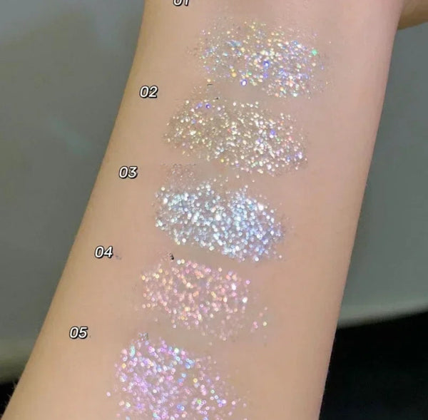 a close up of a person's arm with glitter on it