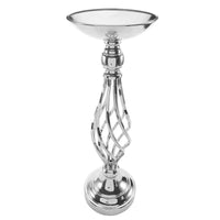 a silver candle holder on a white background