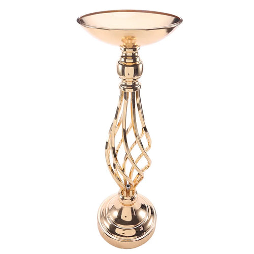 a golden candle holder with a decorative design