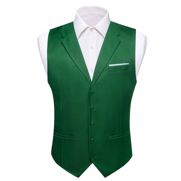 a green vest with a white shirt on a mannequin