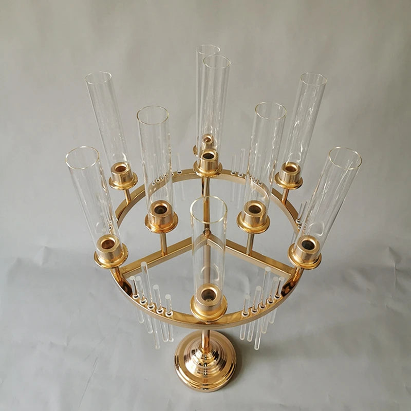 a brass and glass candle holder with eight candles