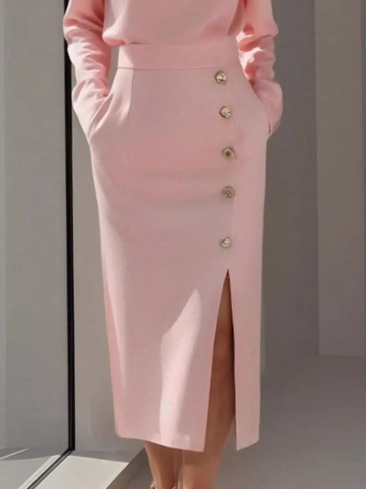 Long Sleeve Button Detail Midi Dress with Side Slit showcasing buttoned details and side slit.