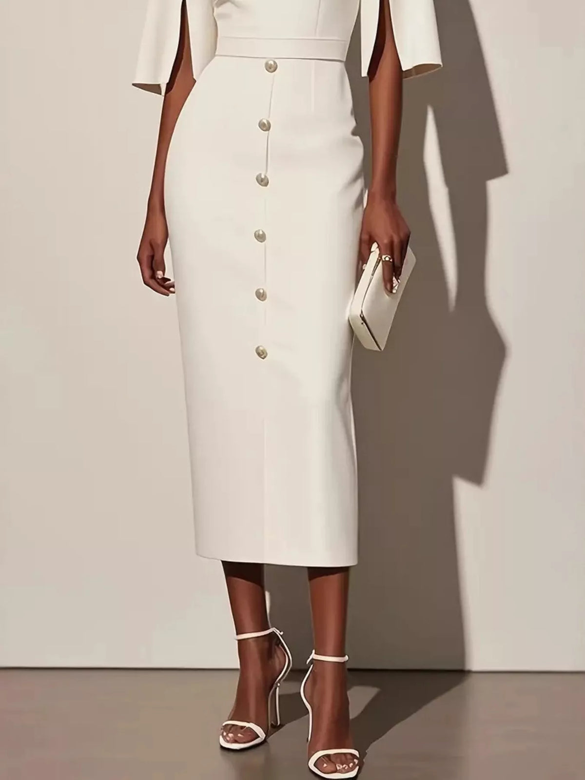Slit Sleeve Midi Dress with Decorative Button featuring a sleek design and decorative buttons on a white dress.