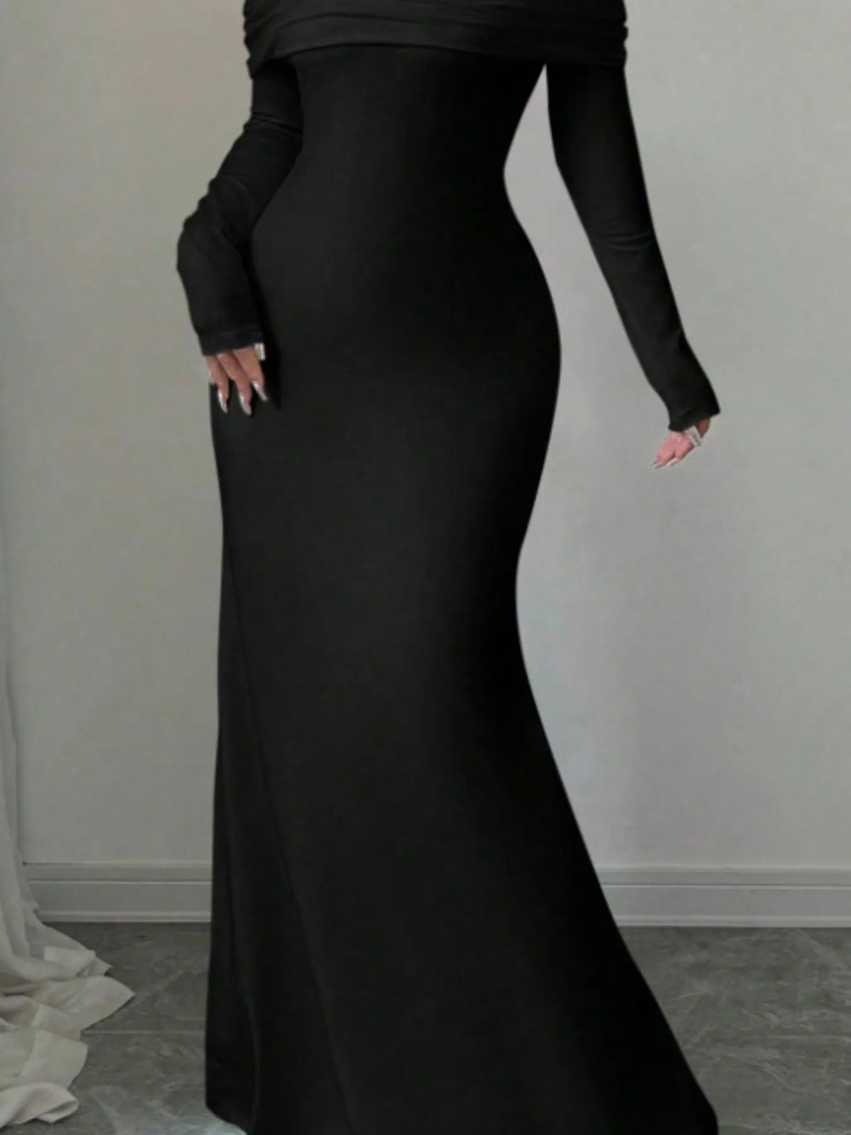Elegant back view of an off-shoulder long sleeve black bodycon maxi dress, perfect for luxurious weddings.