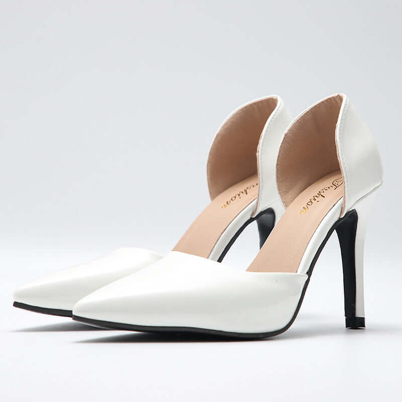Elegant white bridal heels with modern edge from the Something Blue collection by Luxurious Weddings.