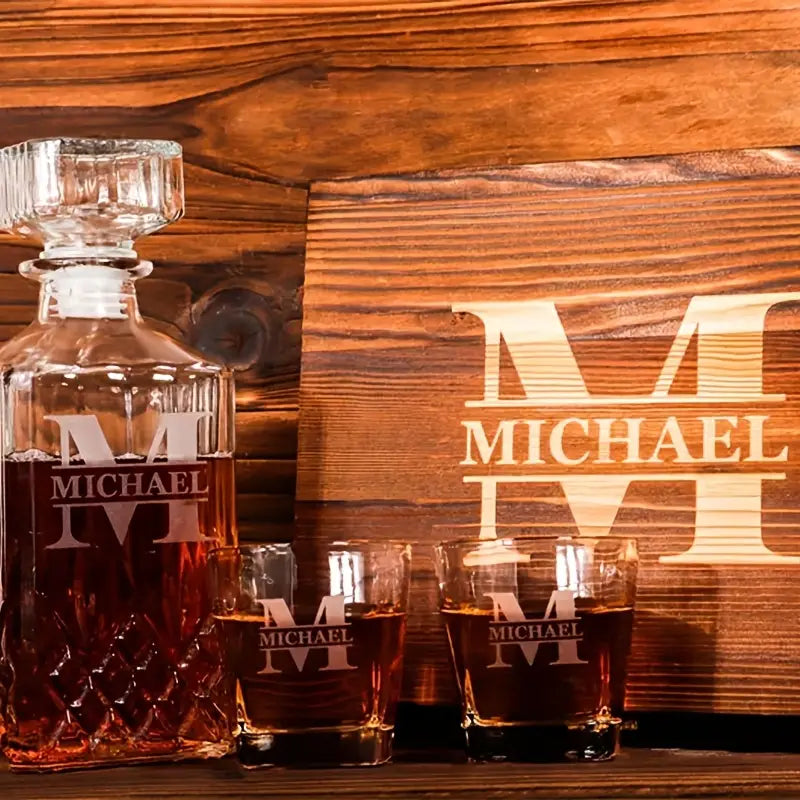 Engraved decanter set with personalized wooden box, featuring a decanter and matching glasses.