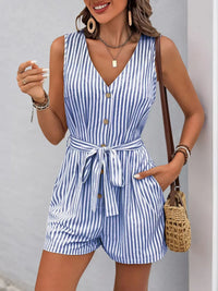 Striped V-neck button front belted romper in blue, featuring a tailored design and side pockets.