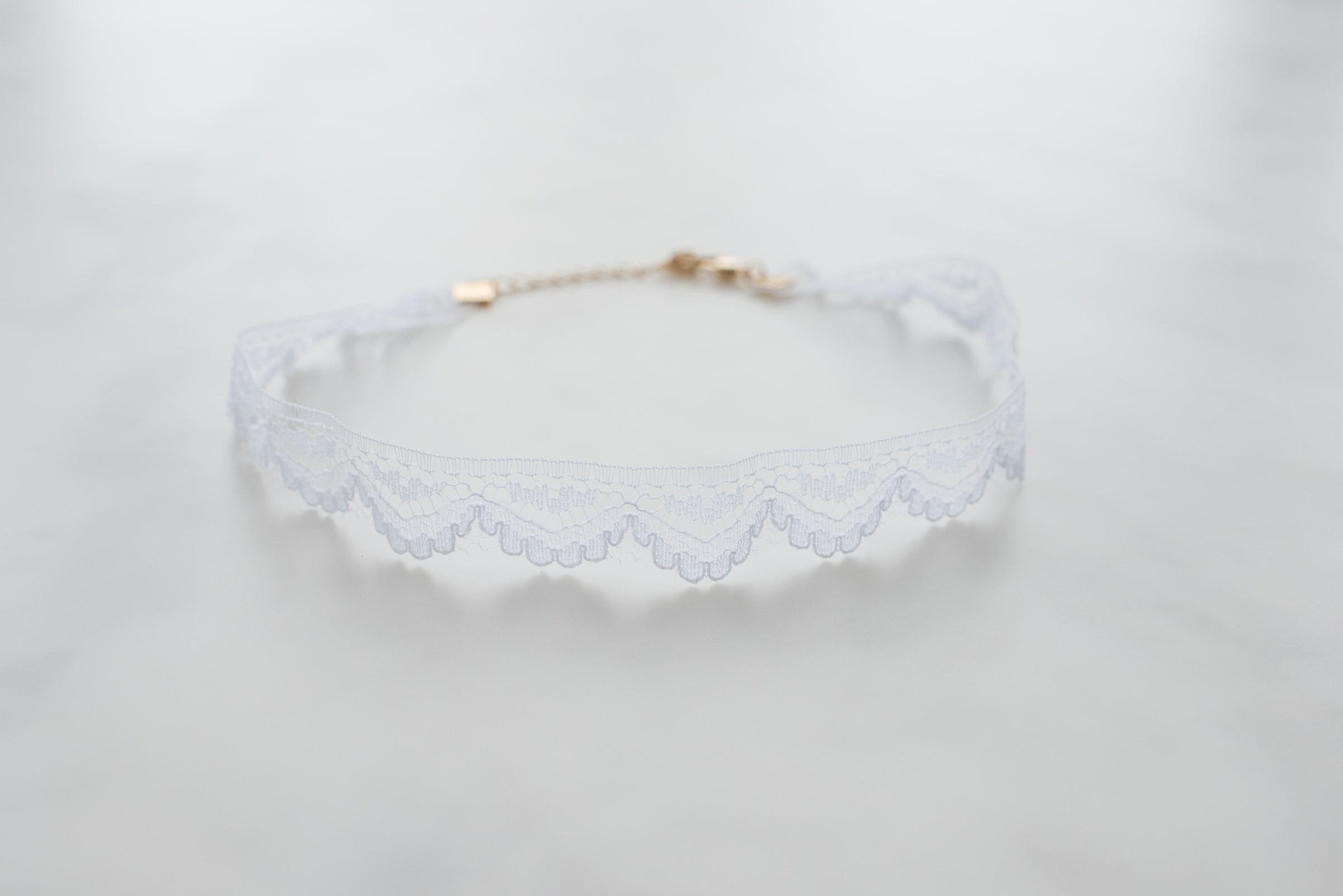 White lace chocker on display white background