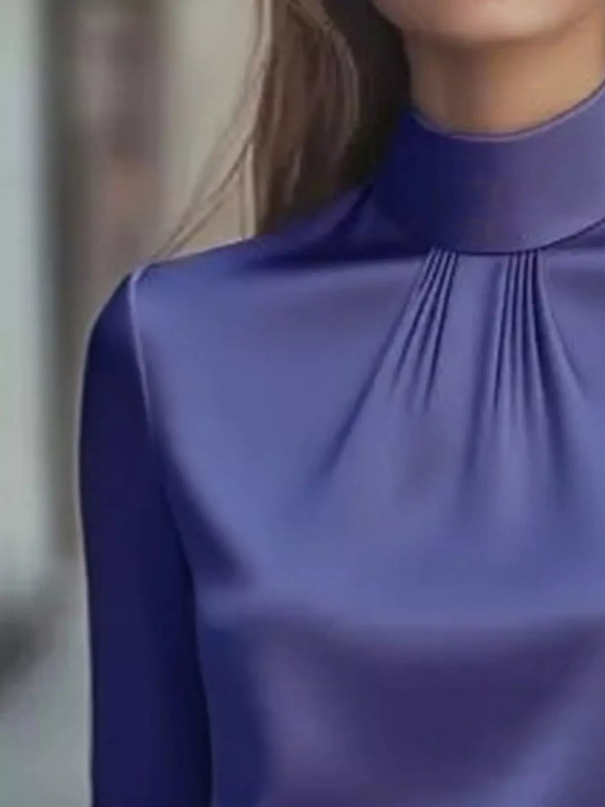 Mock Neck Long Sleeve Blouse with Pleated Detail in elegant purple fabric close-up view.