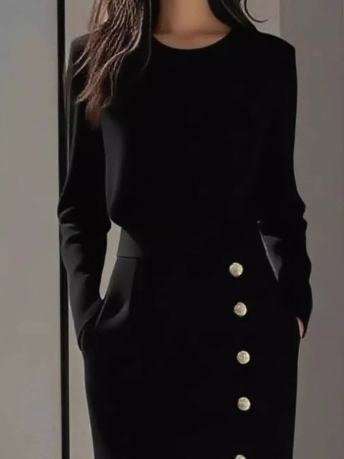 Long Sleeve Button Detail Midi Dress with Side Slit showcasing a black design and button details.