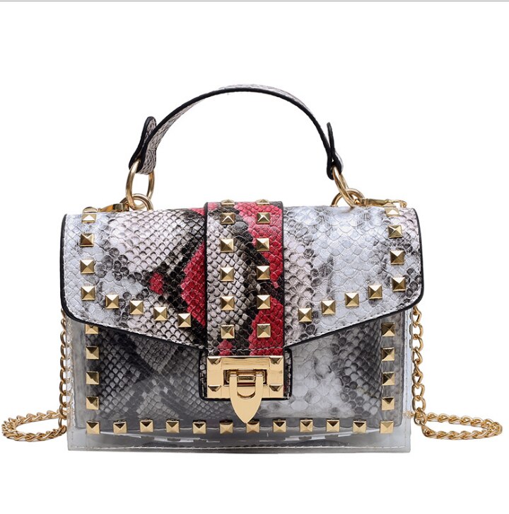 Elegant chains and rivet handbag in snake print with studs, perfect for luxurious weddings and stylish occasions.