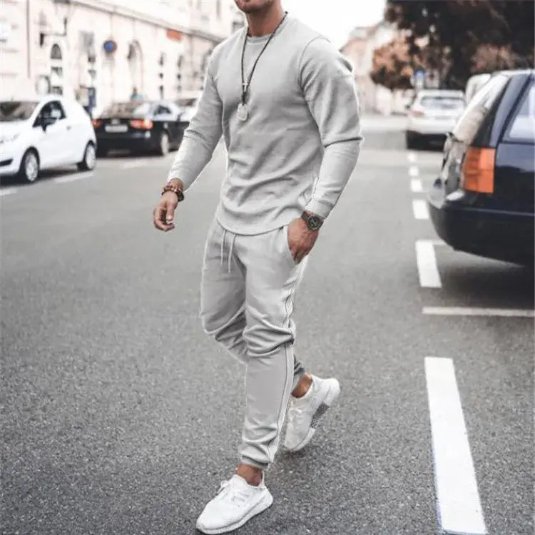 Men's full size round neck long sleeve top and pants set, styled in grey, perfect for casual wear and outdoor activities.