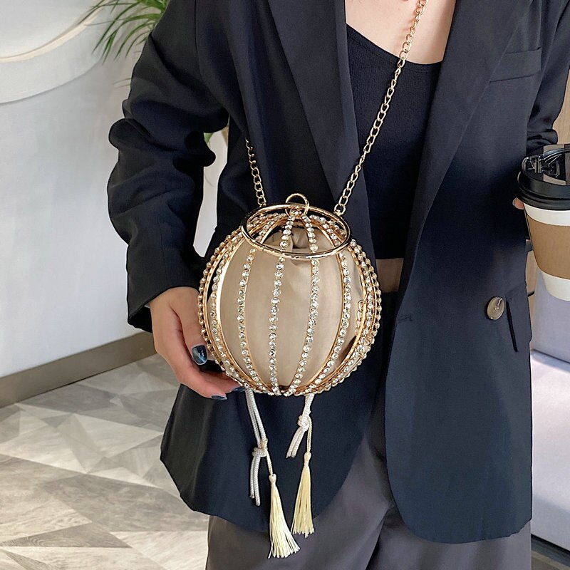 Luxurious diamond pearl flower metal ball handbag for elegant weddings, blending style with functionality.