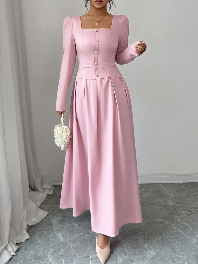 Square neck long sleeve maxi dress in pink with decorative buttons and tailored silhouette.