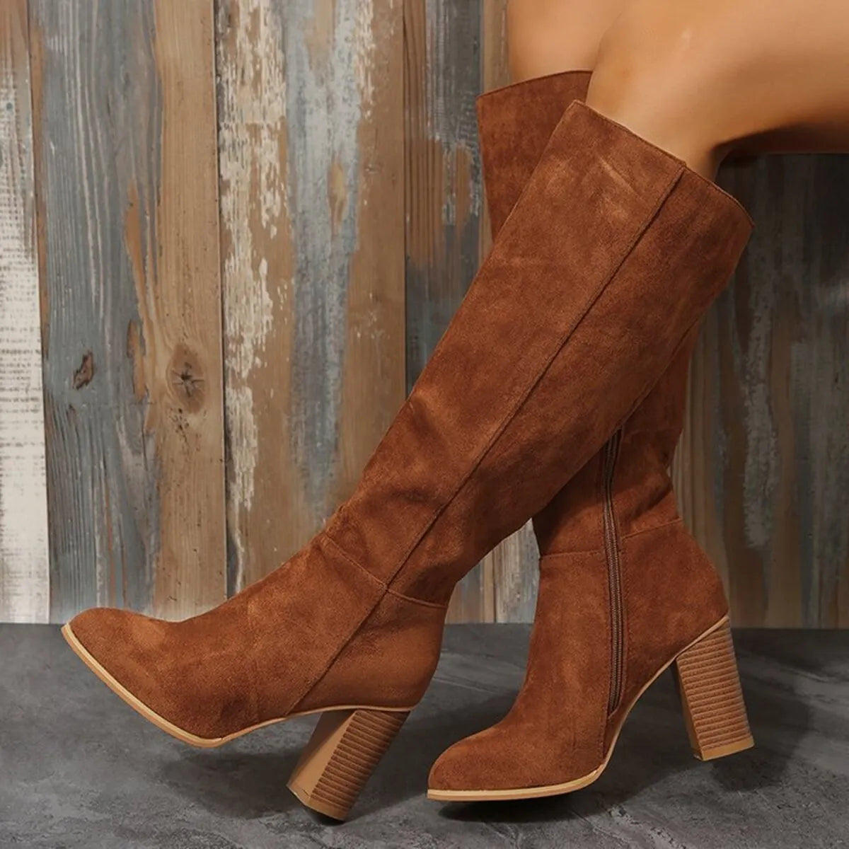 Point toe block heels boots in brown suede with high heel, perfect for stylish outfits. Ideal fit for casual or formal occasions.