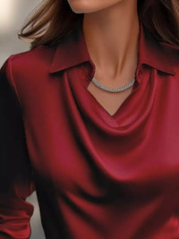 Ruched Long Sleeve Drape Collar Blouse featuring a sleek drape collar and elegant jewelry.