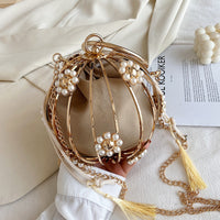 Luxurious diamond pearl flower metal ball handbag, perfect for weddings and elegant occasions.