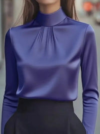 Mock Neck Long Sleeve Blouse with Pleated Detail in rich purple color, featuring a stylish pleated design.
