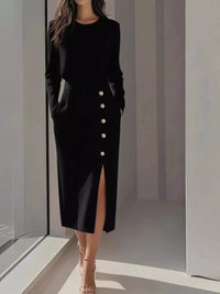 Long Sleeve Button Detail Midi Dress with Side Slit featuring a sleek black design and stylish button detailing.