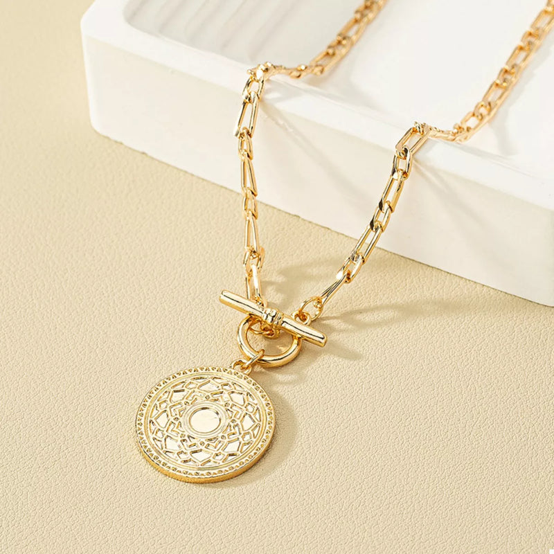 Chain Link Necklace with Vintage Coin Pendant displayed on a neutral background.