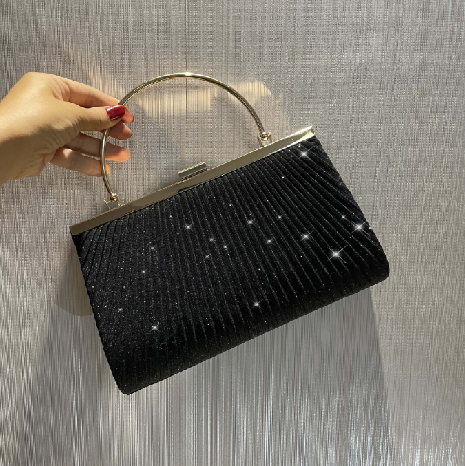 Elegant pleated shiny evening bag handbag perfect for luxurious weddings and stylish occasions.