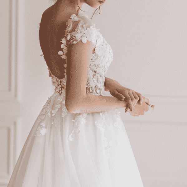 White lace wedding dress with a soft background