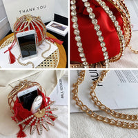Luxurious red handbag with diamond embellishments, perfect for weddings and special occasions.